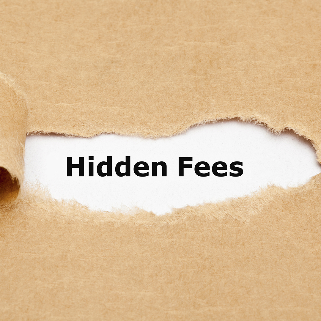 Image of torn paper revealing the words Hidden Fees