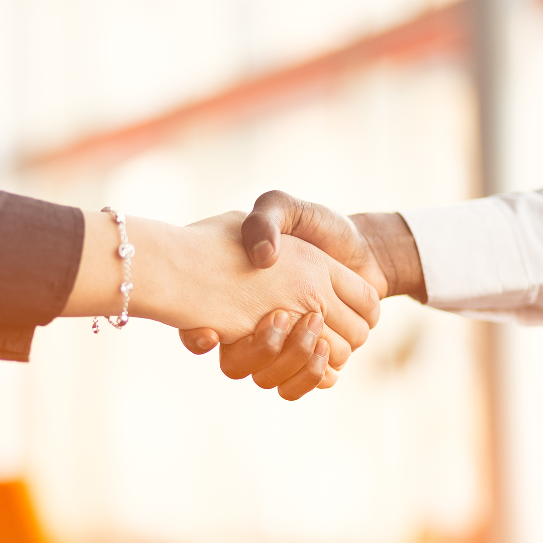 Image of people shaking hands